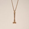 Gavel necklace by Mignonne Gavigan and Lydia Fenet gold